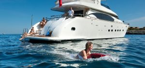 People having fun in a luxury yacht and the sea